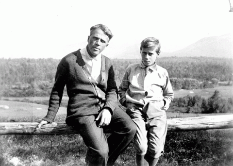 Robert Frost on rail fence with son