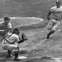 Jackie Robinson stealing home in the 1956 World Series