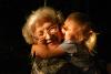 human-moments-grandmother-granddaughter-hugging-connections